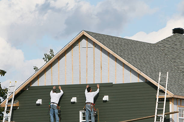 Professional Siding Installation technician working in Sullivan, IL